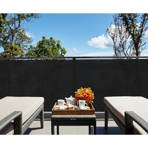 3 Foot By 25 Foot Balcony Privacy Screen Mesh Fence Cover for Deck Railing Outdoor Patio shown in a garden setting
