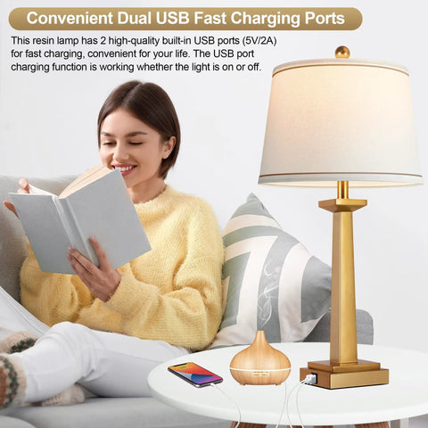 Gold 29 Inch Table Lamps Set of 2 for Living Room shown with USB ports and white shade next to person reading a book.