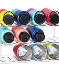 Kick That Bottle Jumble With This 3 Tier Stackable Water Bottle Organizer That Cradles 12 Big Tumblers And Fits Stanley Sizes. Clear rack with colorful tumblers.