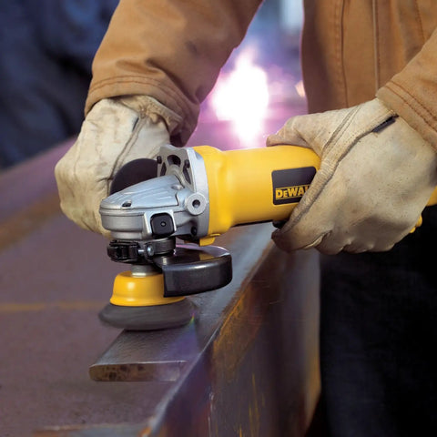 Worker using 3 Inch Knotted Cup Brush With 5 8 11 Arbor For Metal Grinding Removal on steel surface with angle grinder