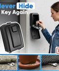 Woman using Wall Mount Key Lock Box With 12 Digit Resettable Code Weatherproof Outdoor Key Safe For Home Office Garage Real Estate Large Capacity Built Tough Metal Code Lock With Mounting Hardware on concrete wall.
