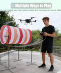Teen using DIY Drone Obstacle Course Kit For FPV Racing, Beginner Friendly Practice Set with cloth tunnel outdoors