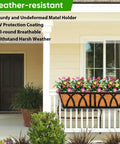 Weatherproof Three Pack 24 Inch Balcony Planter Boxes For Railing And Window Boxes installed on a porch railing with flowers.