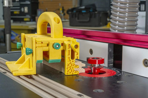 Kickback Buster 3D Push Block With Gravity Heel Kit For Table Saws, yellow plastic, securely holds wood for safe routing.