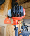 8-Inch Vertical Trimmer Rack Wall Mount Heavy Duty Garden Tool Hanger For Garage Wall Organizer in use holding trimmer
