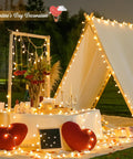 Outdoor Valentine's Day setup with tent adorned in 100 LED Globe String Lights Indoor Outdoor 33ft Warm White With Remote Connectable Fairy Lights