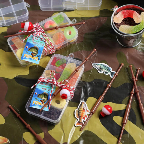 Gone Fishing Party Favors Kit with 12 candy tackle boxes, mini fishing rod picks, red white floats, and thank you cards displayed.