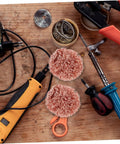 Six Pack Soldering Tip Copper Wire Sponge Balls for efficient tin removal and clean tip on a wooden workbench with tools.