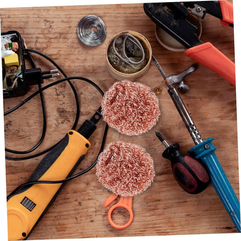 Six Pack Soldering Tip Copper Wire Sponge Balls for efficient tin removal and clean tip on a wooden workbench with tools.