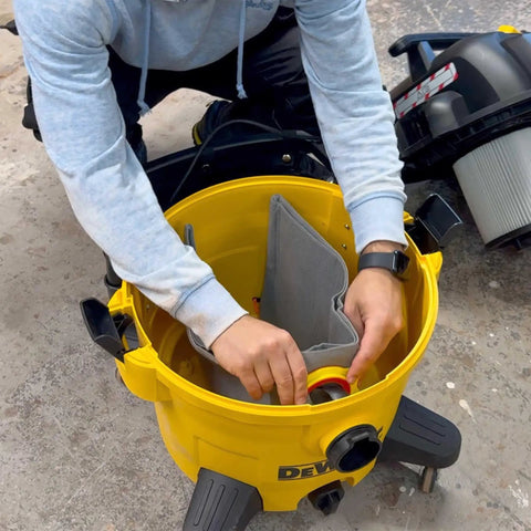 Person installing Reusable Dust Bag For DeWalt And Vacmaster Shop Vacs 4 To 16 Gallon Capacity One Pack Vacuum Bag Filter Bag