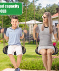 Two Pack Heavy Duty Swing Seats With 500 Pound Capacity And Wider Swing Board Anti Slip Surface Height Adjustable Rope From Fifty To Eighty Inches Built For Backyard Patio Garden Playground with two people enjoying swings.