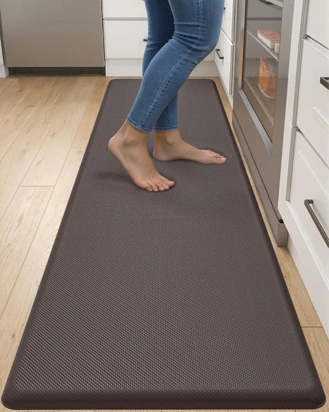 Extra Long Anti Fatigue Kitchen Mat Cushioned Memory Foam Runner Rug 70 By 20 Inches Waterproof Non Slip Backing For Standing All Day At Desk Sink And Laundry In Brown in use on kitchen floor