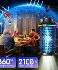 Cordless Outdoor Bug Zapper 2026 Upgraded Elite 4200V Electric Mosquito Zapper in use on patio with people dining nearby