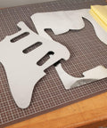 Self Adhesive Aluminum Pickguard Shielding Foil For Guitars Reduces Noise And Hum Shielding Material For Strat Pickguards on a table