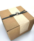 Box secured with Portable One Half Inch Polypropylene Strapping Kit With Mini Coil Tool And Buckles, 3000 Ft Of Poly Strapping