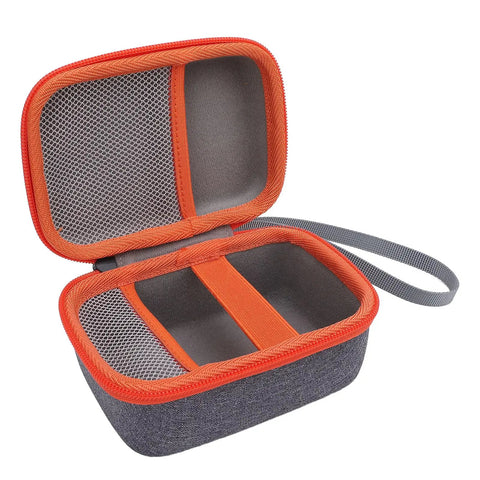 Interior view of orange Hard EVA Case For Kids Music Player With Velvet Lining Travel Storage Bag showing mesh pockets.