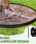 Landscape Edging Kit 33 Foot Roll 4 Inch Plastic Garden Edging With 100 Spikes shown bordering tree roots on lawn
