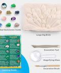 Gemstone dig kit with excavation tools, dig brick, learning guide, and 10 real gems including amethyst and pyrite.