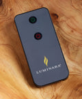 Remote Control For Real-Flame LED Flameless Candles With Real Flame Effect, Turn On And Off From Up To 15 Feet, Works With Remote-Ready Candles, Includes Replaceable CR2025 Battery on wooden surface