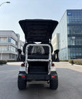 Premium White Six Seater Electric Golf Cart Featuring Hella Roomy Seats And Seamless Pedal Free Operation Driven By A Smooth 48V Lithium Battery Paired With A Powerhouse 5kW Motor For Easy Neighborhood Cruising And Lazy Weekend Hangouts, rear view showcasing spacious seating.