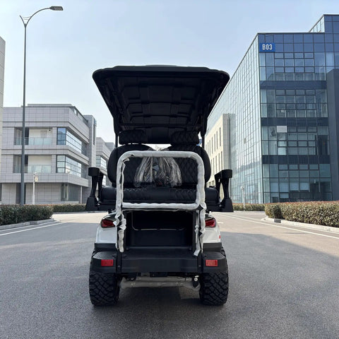 Premium White Six Seater Electric Golf Cart Featuring Hella Roomy Seats And Seamless Pedal Free Operation Driven By A Smooth 48V Lithium Battery Paired With A Powerhouse 5kW Motor For Easy Neighborhood Cruising And Lazy Weekend Hangouts, rear view showcasing spacious seating.