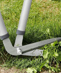 Heavy Duty Border Shears cutting grass, featuring Long Handle Edging Shears For Lawn And Garden, 80 cm reach, nonstick blades.