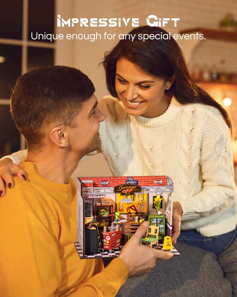 Couple holding DIY Miniature House Kit Garage Workshop With LED Lights, suitable gift idea, product shown in box with accessories