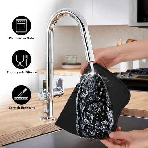 Hand washing Silicone Coffee Tamper Mat 8 Inch By 6 Inch For Espresso Tamping, Non Slip Barista Pad under a kitchen tap
