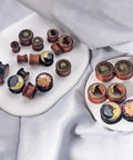 Six Piece Ear Plugs Set Sun Moon Natural Wood And Acrylic Tunnels Expander Plugs For Piercing Includes 0G 00G 8Mm 10Mm 12Mm And 14Mm Screw In Design displayed on trays