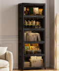 No Sweat Roll Away Stackable Storage Bins With Smooth Casters And Parking Brakes large black organizer displaying contents in a room.