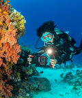 Diver using SportDiver Underwater Phone Housing For Depths Up To 130 Feet, Waterproof Case With Easy Camera Access near coral reef