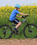 Child riding Beefed Up Dual Suspension 24 Inch Mountain Bike With 21 Speed Disc Brakes Front Fork And Rear Shock Absorber Carbon Steel Frame