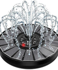 Black solar fountain with 2000mAh battery and smart indicator, 3.5W glass water pump for outdoor decor, 7 nozzles, cloudy days.