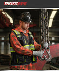 Top Notch Class 1 Black Safety Vest With Ten Roomy Cargo Pockets And 3M Reflective Straps, worn during cargo handling.