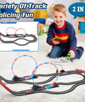 Child playing with Dual Lane Slot Car Race Track Set With Four High-Speed Cars, Electric Track, Dual Controllers, Circular Overpass Design
