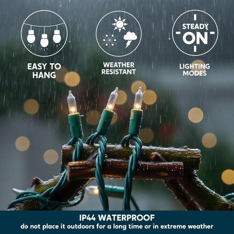 Lit Clear Christmas String Lights Indoor Outdoor 100 Count Mini White Fairy Lights Nineteen Point Four Feet Green Wire UL588 Certified IP44 Waterproof highlighting waterproof feature during rain