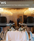 Two 12 Inch Bluetooth PA Speakers 800W with TWS Link in elegant venue setting, ideal for DJ sets and live music events.