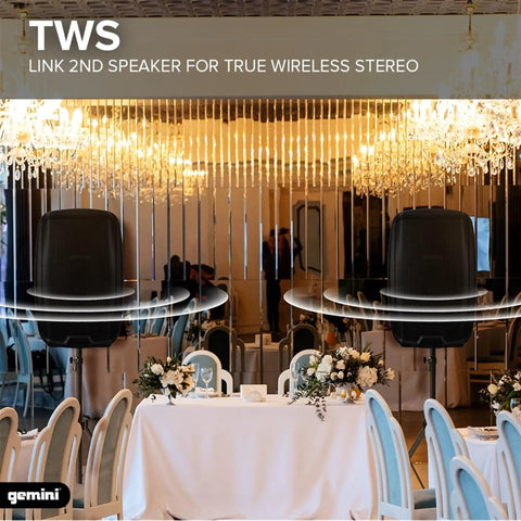 Two 12 Inch Bluetooth PA Speakers 800W with TWS Link in elegant venue setting, ideal for DJ sets and live music events.