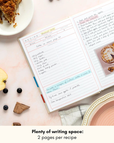 Open spread of Blank Recipe Book To Write Your Own Recipes For Family Keepsakes Durable Hardcover Cookbook Journal on a table.
