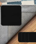 Four Pack Rug Grippers For Hardwood Floors That Keep Rugs Staying Put, Non Slip Pads With Double Sided Tape shown under a rug corner