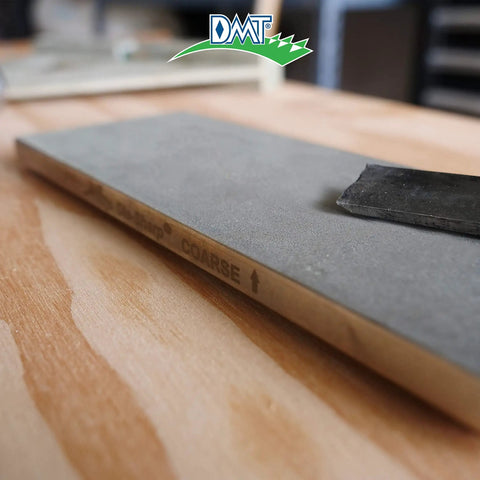Dia Sharp Diamond Knife Sharpener Bench Stone for Home, Shop and Jobsite Coarse 325 Grit with non-slip base on wooden surface