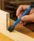 Easy Clean Silicone Glue Spreader in use on wood, showing dual end design with biscuit-tip and silicone brush for precise joinery