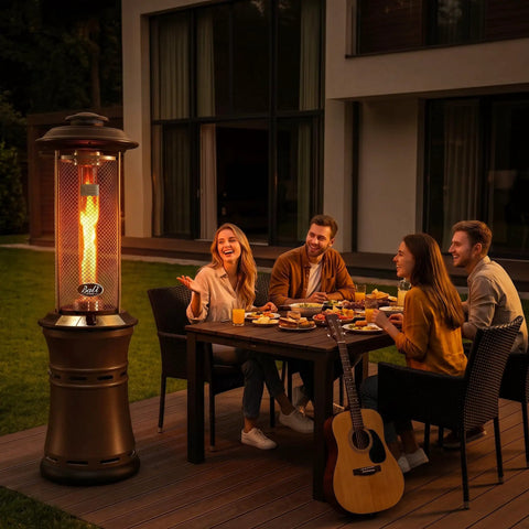 Gas Patio Heater With Wheels, Floor Standing Outdoor Heater With Round Dancing Flame And Glass Tube, Quick No Tool Setup Under Five Minutes, 20 Lb Propane Tank Compatible For Balcony Veranda And BBQ Party next to dining table on a patio.