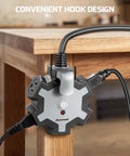 Heavy Duty 15 Feet Extension Cord With Five Outlet Power Hub For Workshop And Job Sites Fo Sho Reliable Overload Protection Built In Circular Layout Fits Bulky Plugs Straight Up Essential Gear with convenient hook design on wooden table.