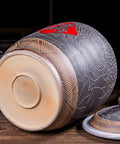 Top Shelf Ceramic Rice Storage Jar With Wooden Base Stand showcasing the intricate elegant Chinese pattern design.