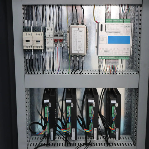 Internal wiring of rugged wood router machine with high precision engraving and milling, electrical components visible