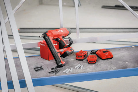 C 4 36 90 Battery Charger For 18 To 36 Volt Lithium Ion Packs on construction site with red power tools and chargers