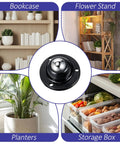 Premium Self Adhesive Caster Wheels For Furniture Legs Featuring A Rock Solid 360 Degree Low Profile Swivel Design Made From Heavy Duty Abs And Brushed Stainless Steel In Matte Black used under plant pot in a home setting.