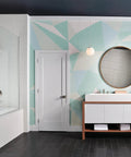 Modern bathroom with geometric wall, oval mirror, and Xander Widespread Bathroom Faucet Brushed Nickel Three Hole Configuration.