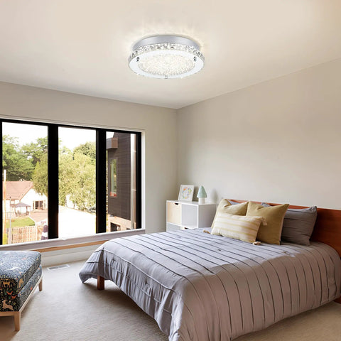 Flush Mount LED Crystal Ceiling Light, 13 Inch Modern Fixture With Edge Crystal Glass in a contemporary bedroom setting.